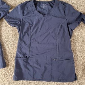 Cherokee infinity scrubs. 3 scrub tops, 1 pair of joggers, 2 pants, and a jacket